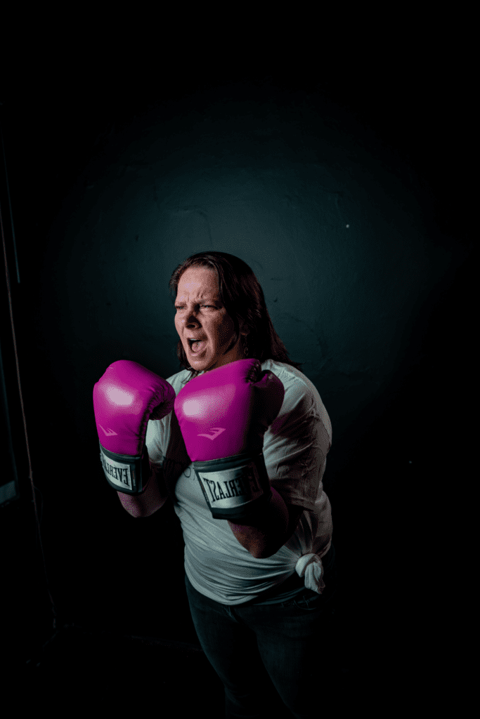 Lady in pink boxing gloves