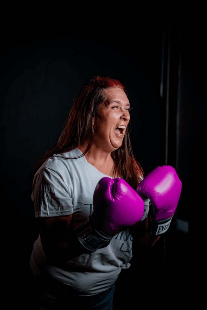 Lady in pink boxing gloves